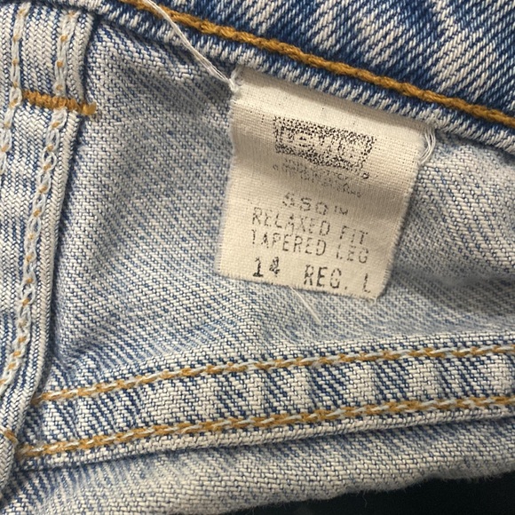 90's Vintage 550 Levi's Relaxed Fit with Tapered Leg faded blue jeans USA made - Picture 5 of 11